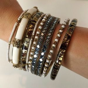 Stacked ornate bangle bracelets